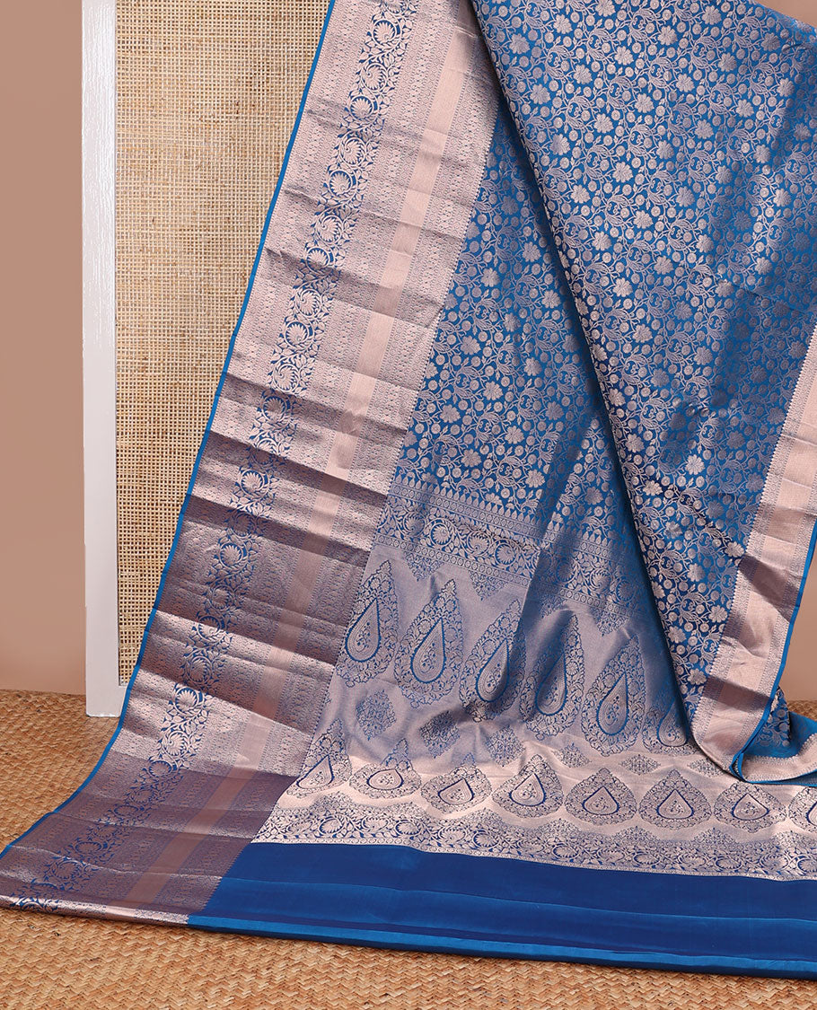 Blue floral jacquard kancheepuram silk saree with self border of thilakam mokku, banaras, poo chakram, manga, kodi visiry design & zari design pallu