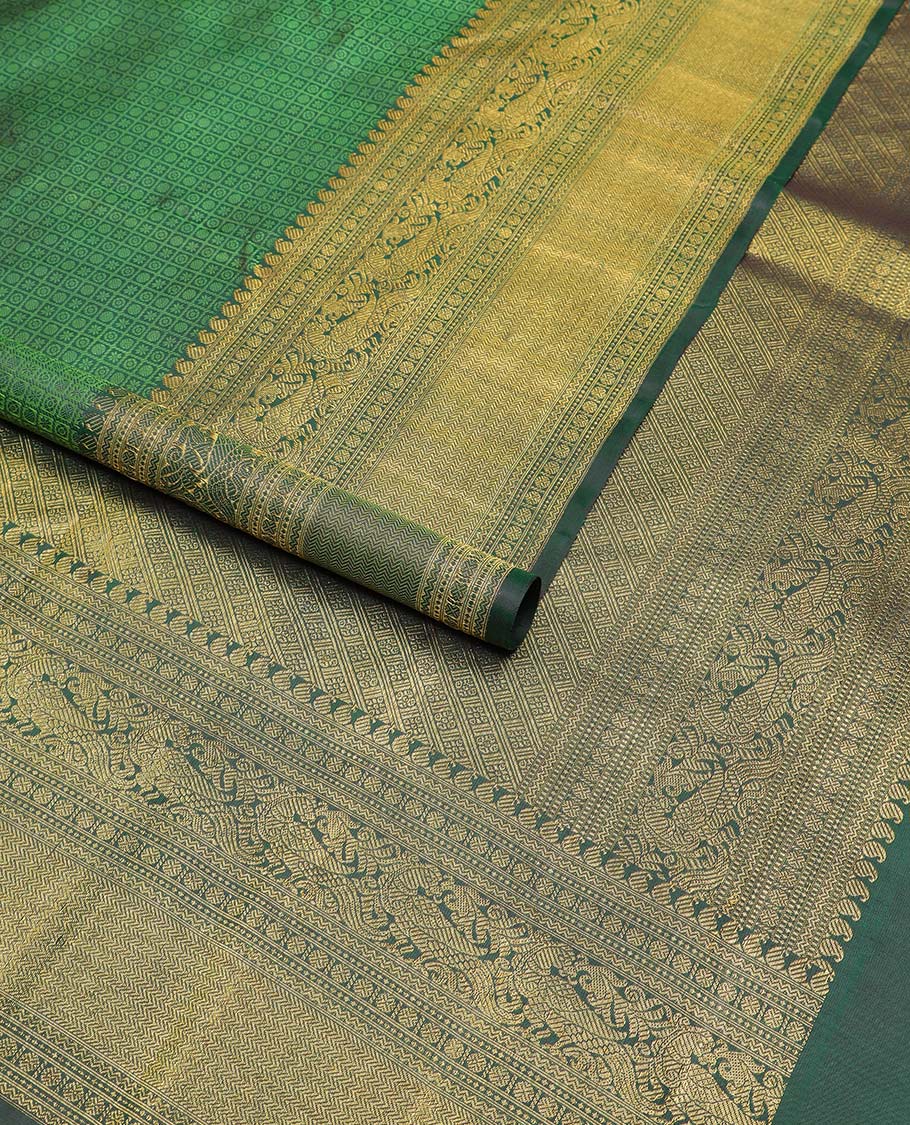 Green checked, floral design silk saree with self border of manga, paun, muth, kathir design & jaal design pallu