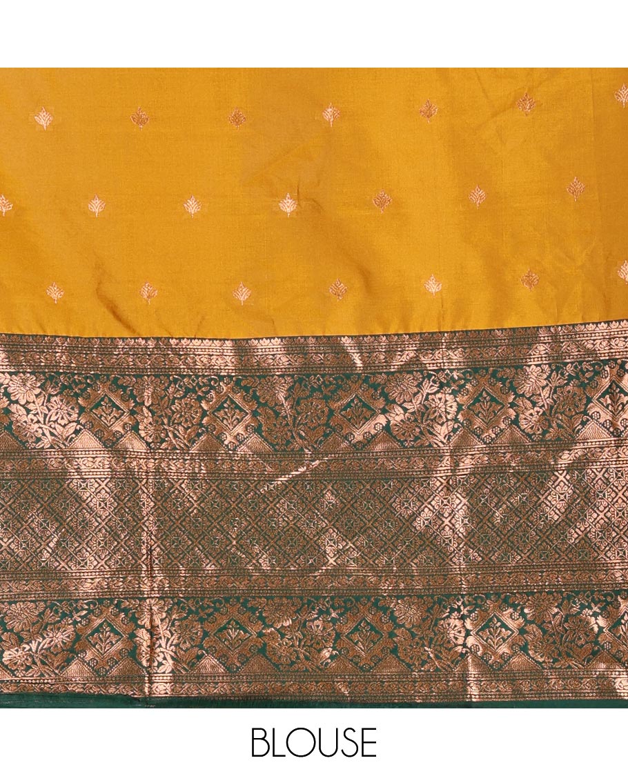 Mustard taffeta silk half saree, zari buttas with contrast green traditional zari border, matching zari blouse, and contrast plain zari border dhavani