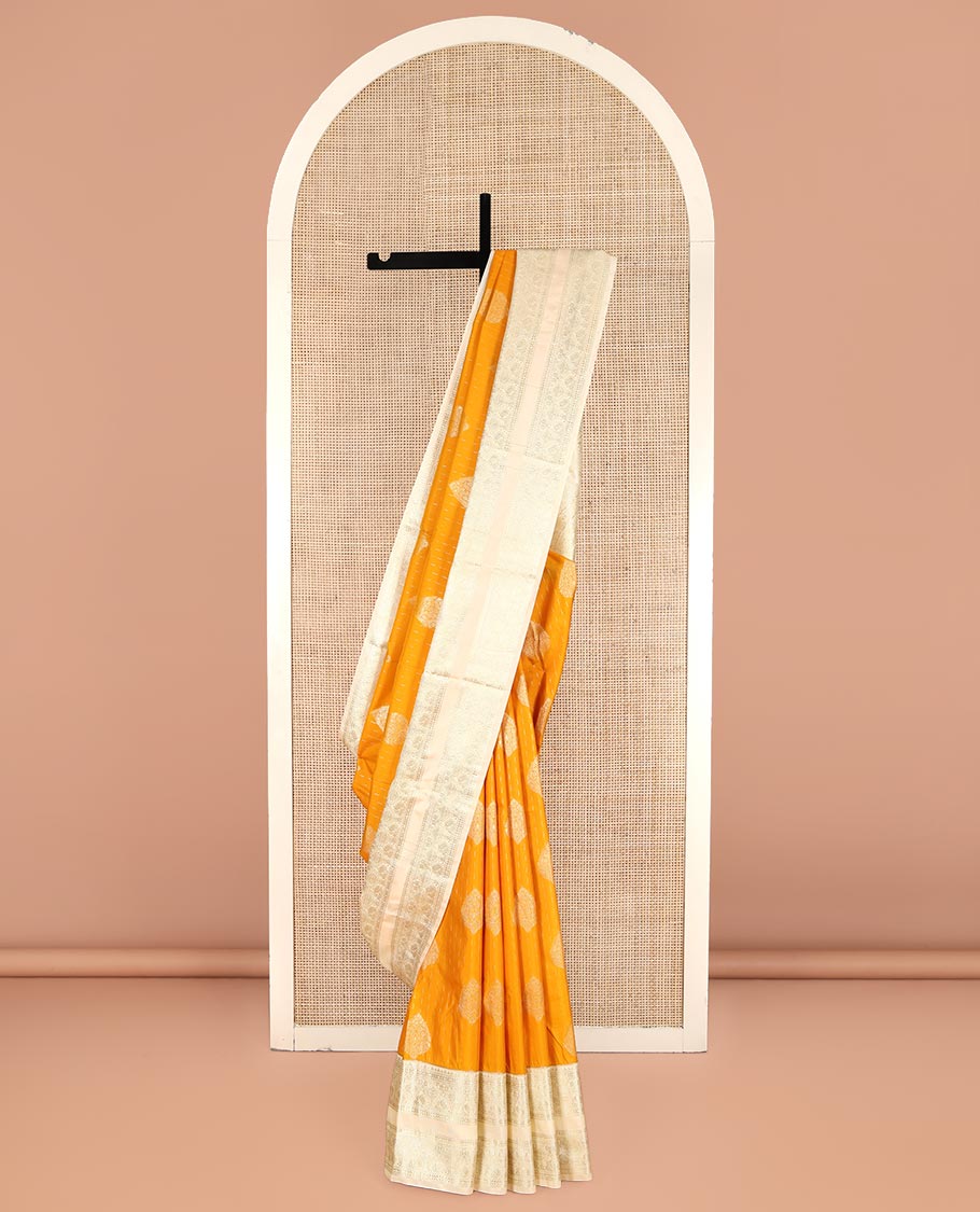 Yellow Budget Silk Saree, Steeped in the Richness of Zari Buttas All Over Its Body, Complemented by Contrast Varisai Pettu Traditional Zari Design Border, an Intricately Designed Pallu, and Paired with a Contrast Blouse