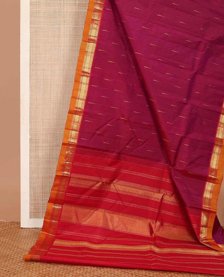 Magenta malli mokku buttas Kanchipuram silk saree, contrast border of rekku, banaras, and mayil kann designs, and traditional design pallu