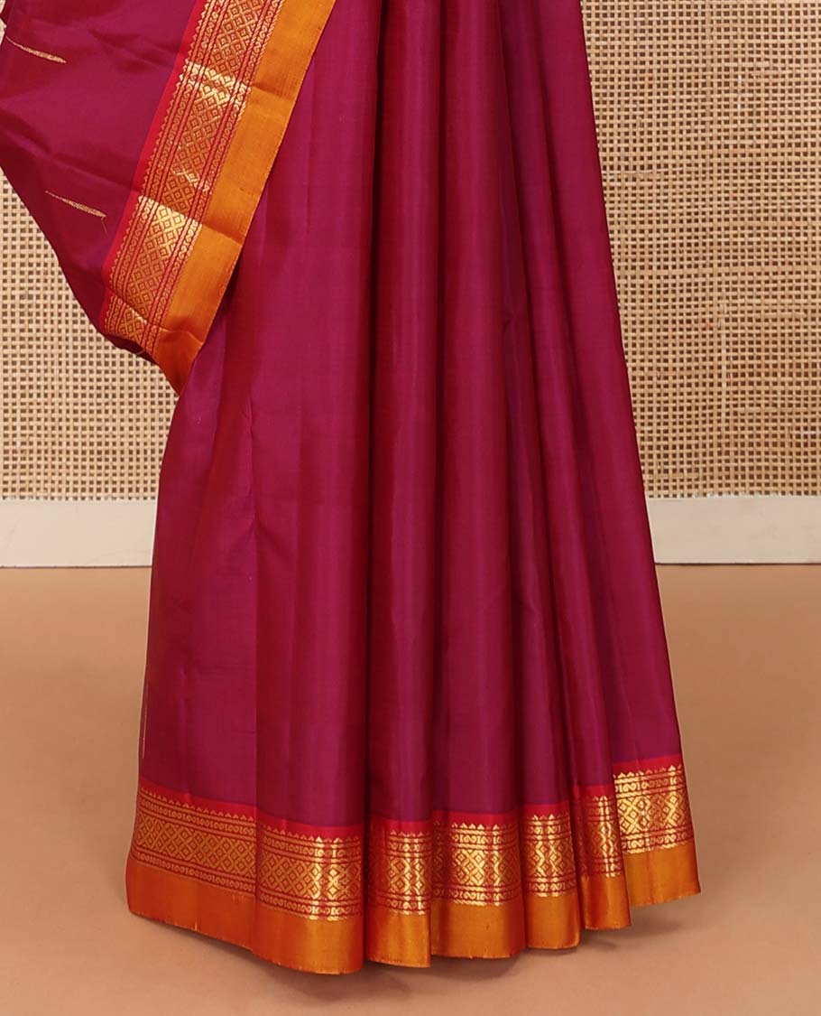 Magenta malli mokku buttas Kanchipuram silk saree, contrast border of rekku, banaras, and mayil kann designs, and traditional design pallu