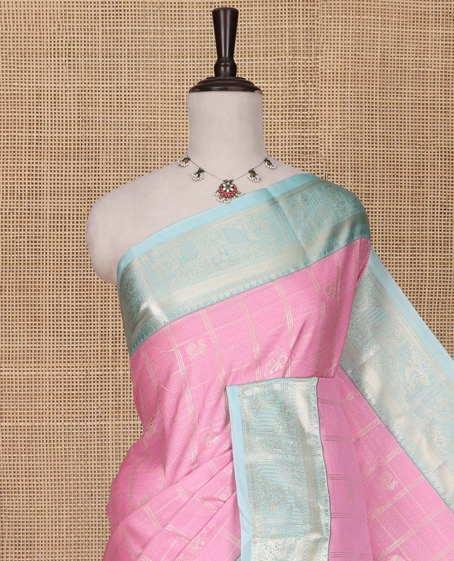 Pink Budget Silk Saree, Woven with Peacock-Elephant Butta Enclosed Checks on Its Body, Complemented by a Contrast Traditional Zari Design Border, Sparsely Sparkled Pallu, and Paired with a Contrast Blouse