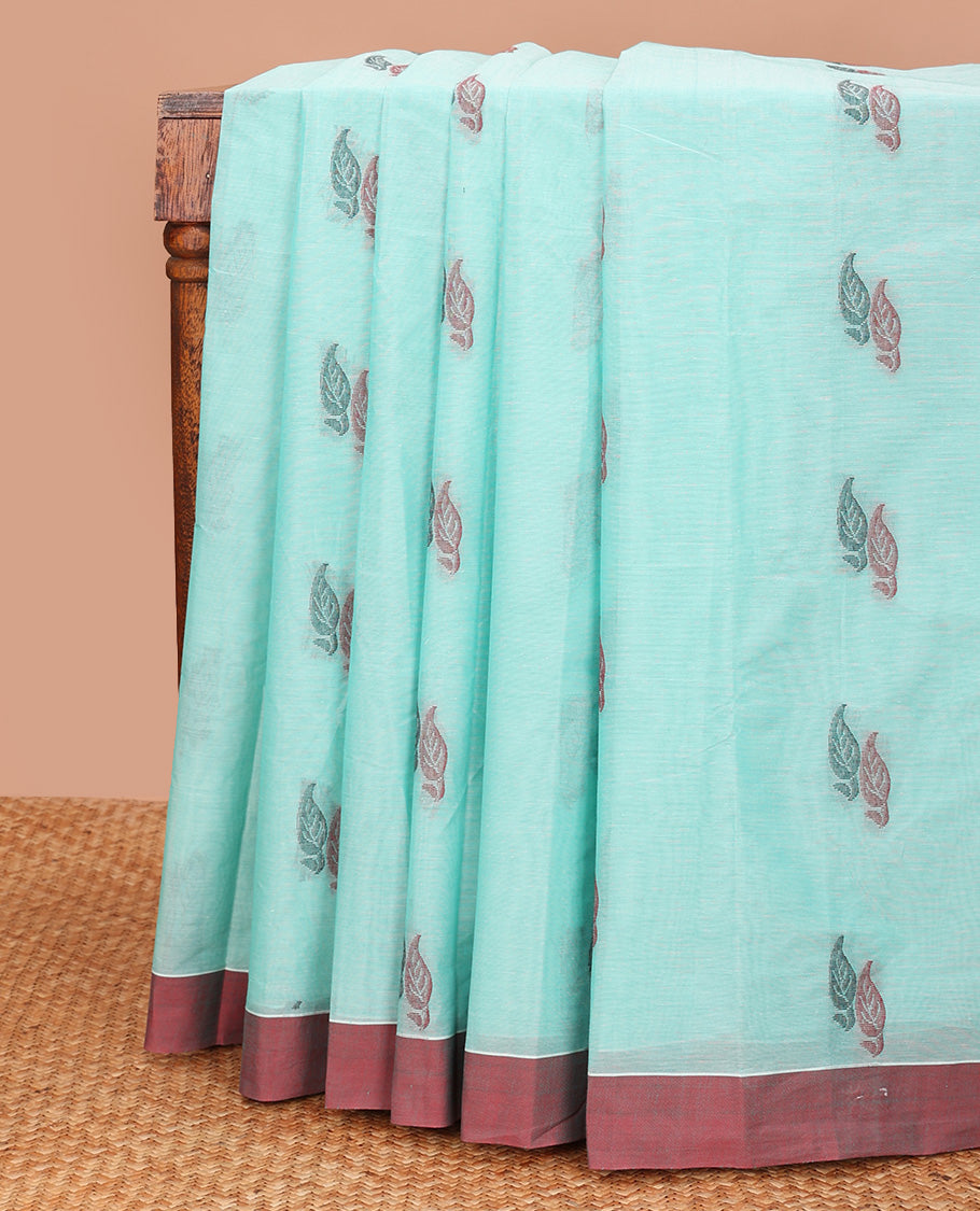 Blue leaf buttas kanchi cotton saree, contrast plain border, and floral design pallu