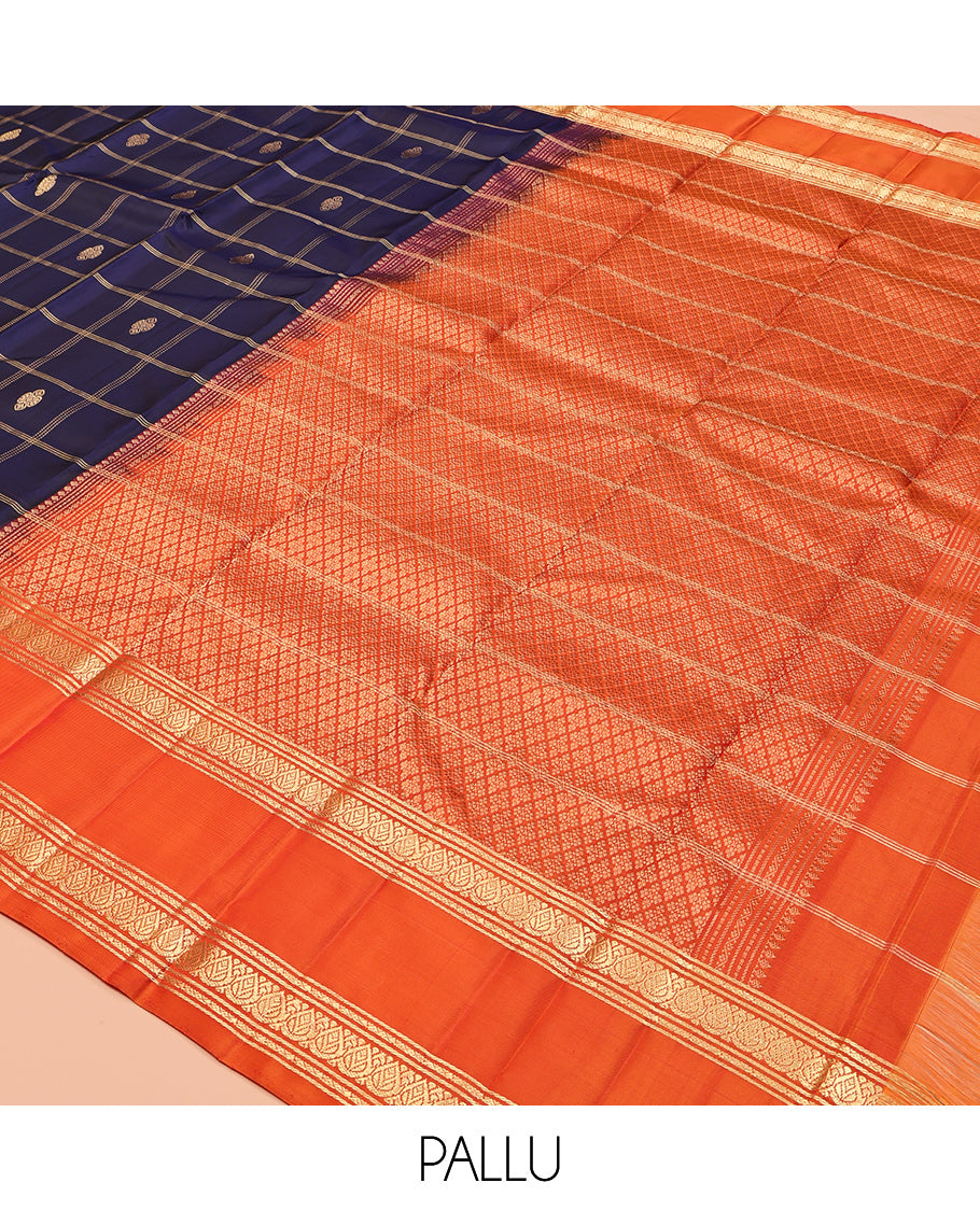 Blue Kanchipuram Silk Saree, Gleamed Up with Butta Enclosed Checks, Complemented by a Contrast Rettai Pettu Zari Border, Grand Pallu, and a Contrast Blouse