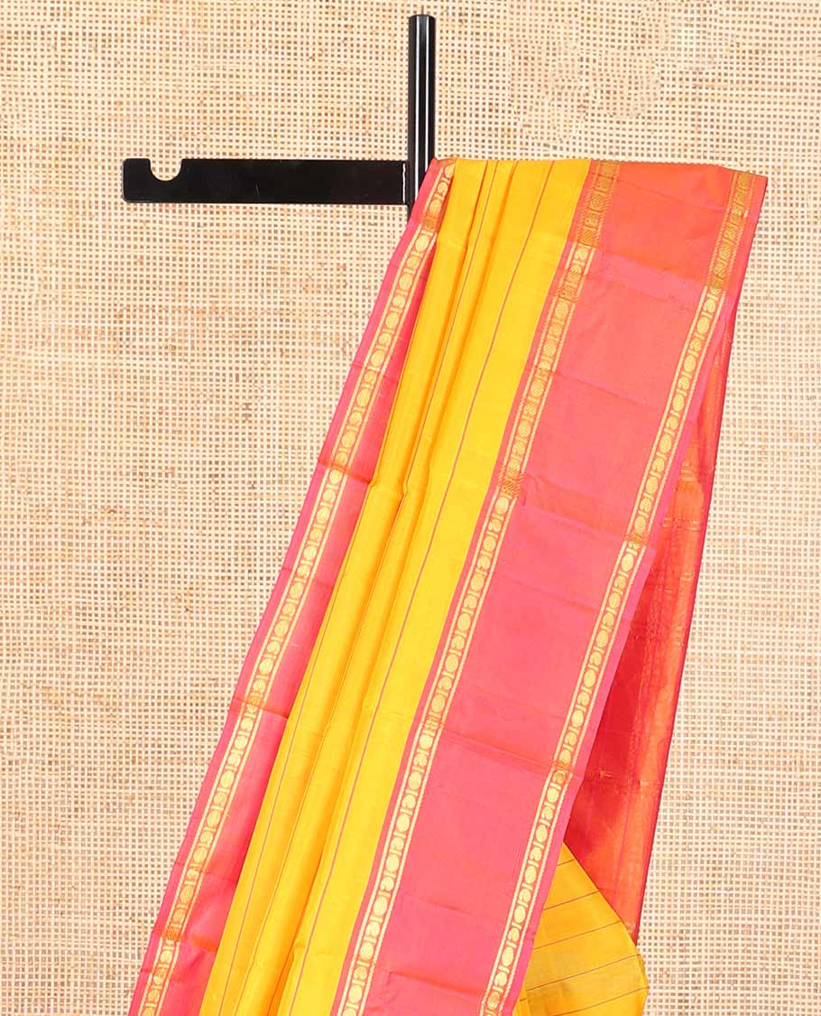 Orange striped kancheepuram silk saree with contrast rettai pettu border of banaras, paun design & zari design pallu