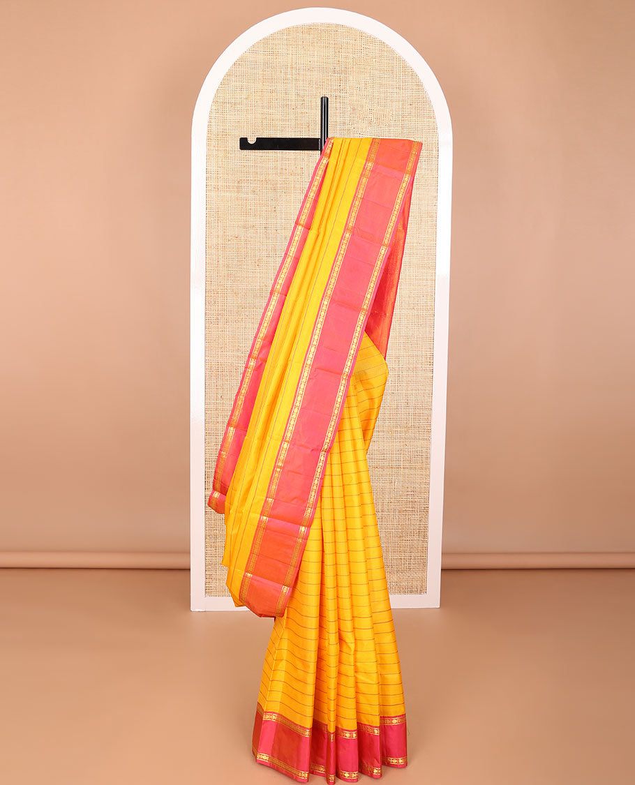Orange striped kancheepuram silk saree with contrast rettai pettu border of banaras, paun design & zari design pallu
