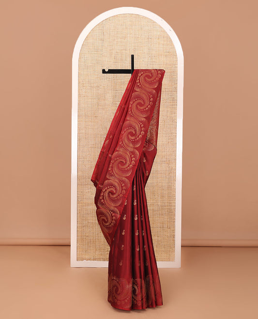 Red soft silk saree with zari buttas, spiral shaped zari woven border & zig-zag striped pallu