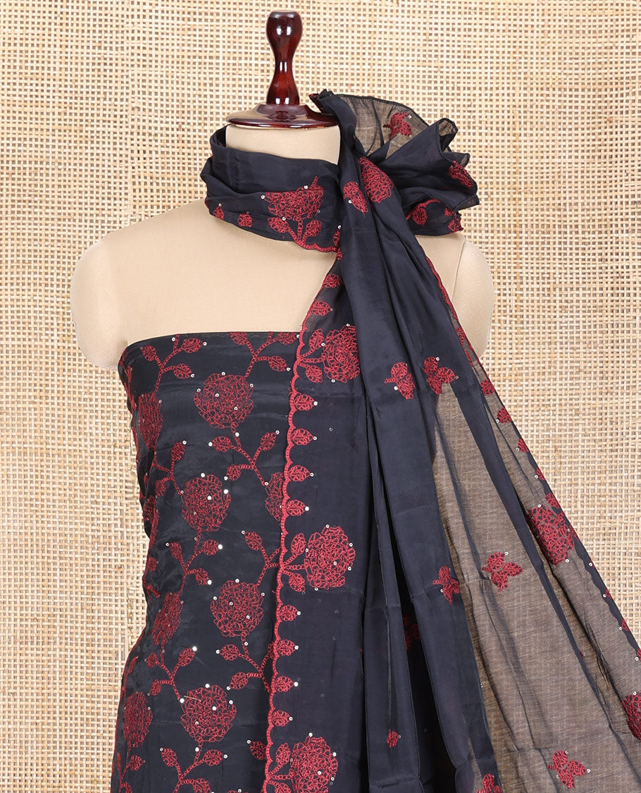 Black Mul Chanderi Material Churidar Features Floral Vine Embroidery Top, a Plain Bottom, and a Embroidered Dupatta