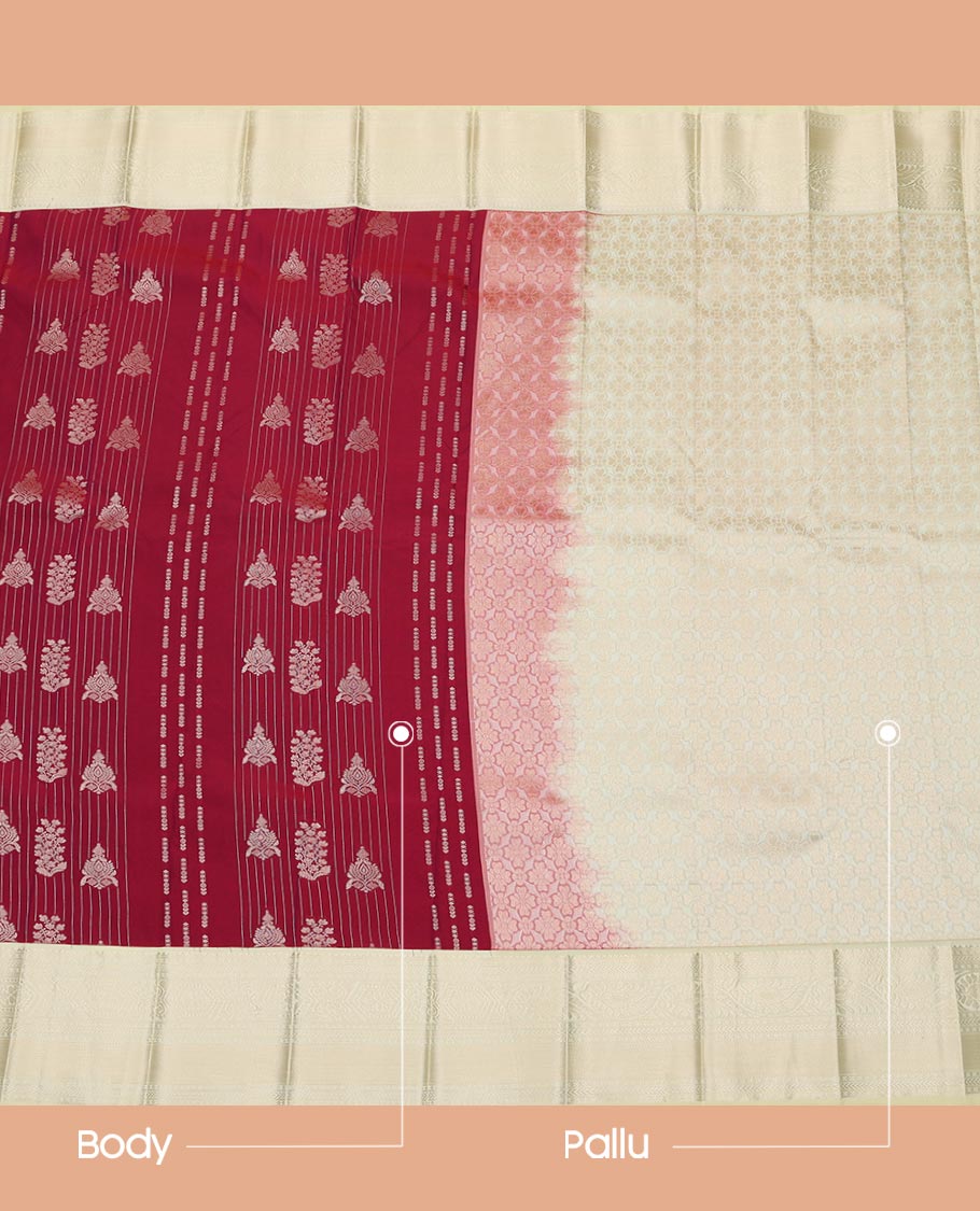 Maroon Budget Silk Saree Adorned with Zari Buttas All Over Its Body, Complemented with a Contrast Traditional Zari Design Border, Floral Zari Decked Up Pallu, and a Contrast Zari-Bordered Blouse