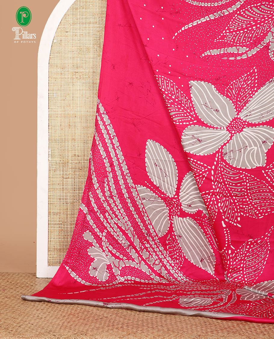 Borderless pink half-and-half model satin saree with batik-style big floral motifs digital printed body and pallu