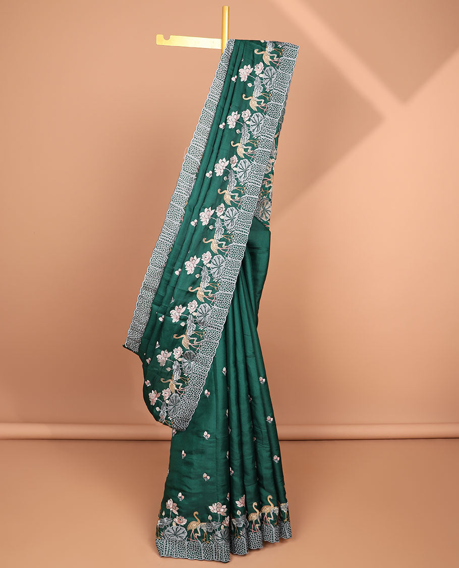 Green all-over floral motifs thread embroidery tussar silk saree with self floral, animal embroidery border