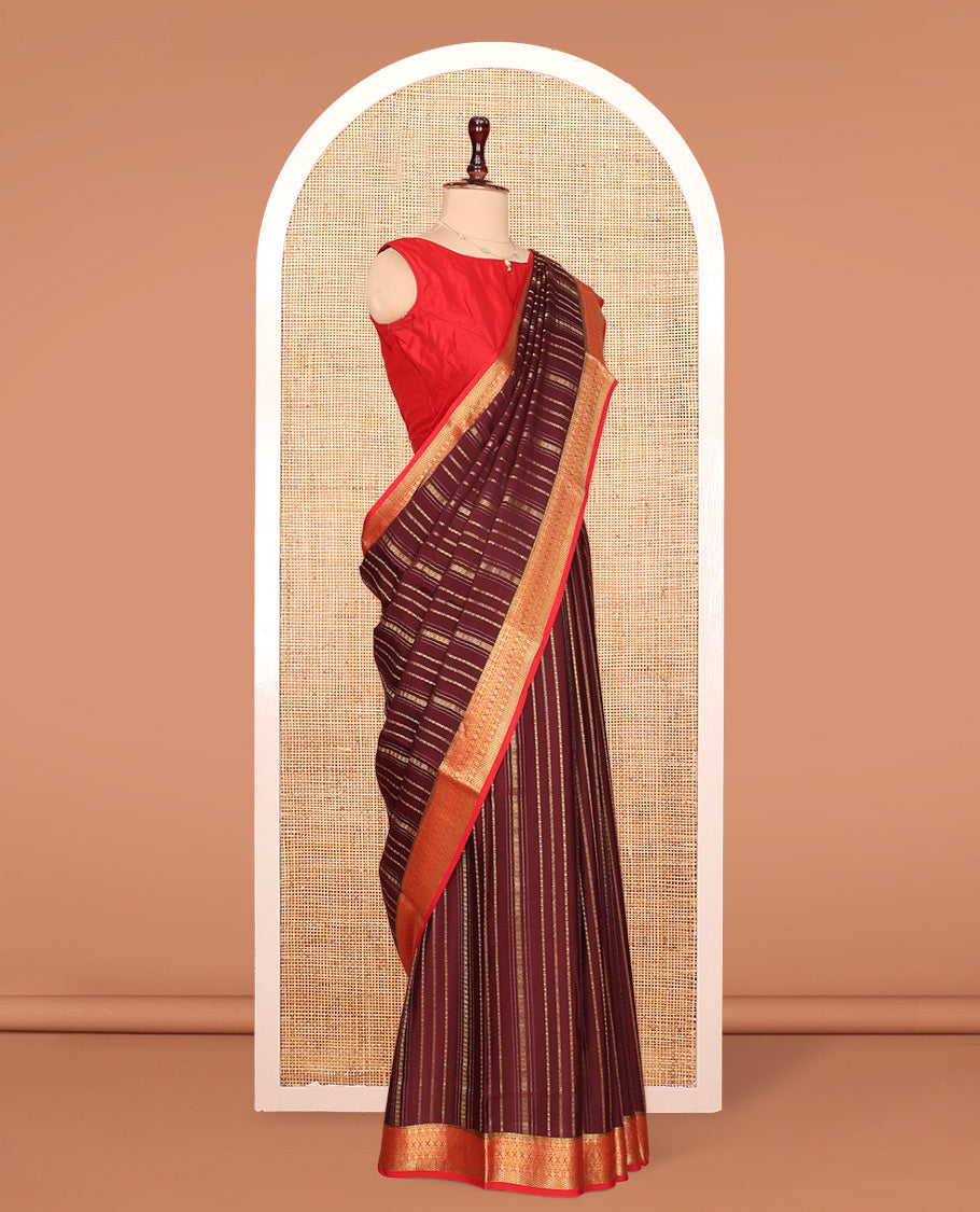 Brown Mysore Silk Saree, Spotlighted By Geometric Zari Designs All Over Its Body, Complemented by Captivating Contrast Border of Traditional Zari Designs, Gleaming Zari Striped Pallu, and Paired with a Contrast Blouse