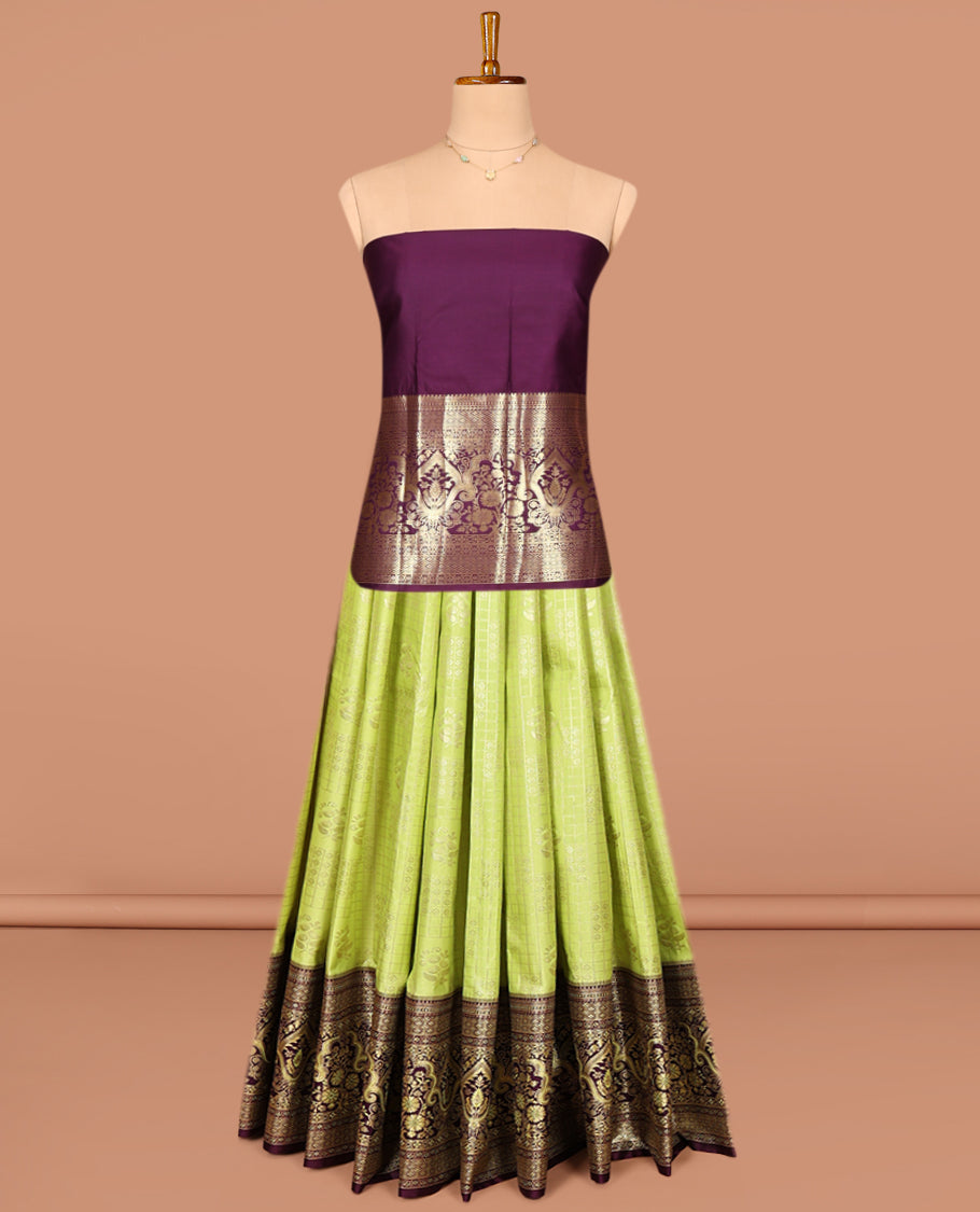 Green Art Silk Pavadai Material Set, Decorated with Zari Buttas and Zari Checks on Its Skirt, Complemented by a Contrast Mughal-Style Zari Designs Border, and Paired with a Contrast Blouse