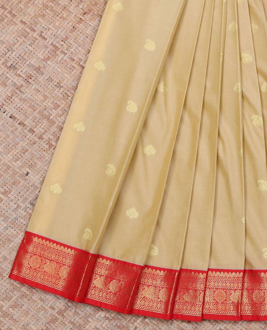 Sandal Budget Silk Saree, Woven with Buttas All Over Its Body, Complemented by a Contrast Traditional Zari Design Border of Peacock and Chakram, Pallu of Jaal Designs, and Paired with a Contrast Blouse