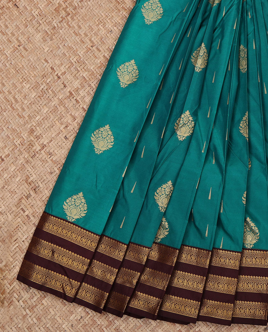 Green Budget Silk Saree, Gleamed Up with Zari Buttas All Over Its Body, Complemented by a Contrast Traditional Zari Design Varisai Pettu Border, Grand Jaal Pallu, and Paired with a Contrast Blouse