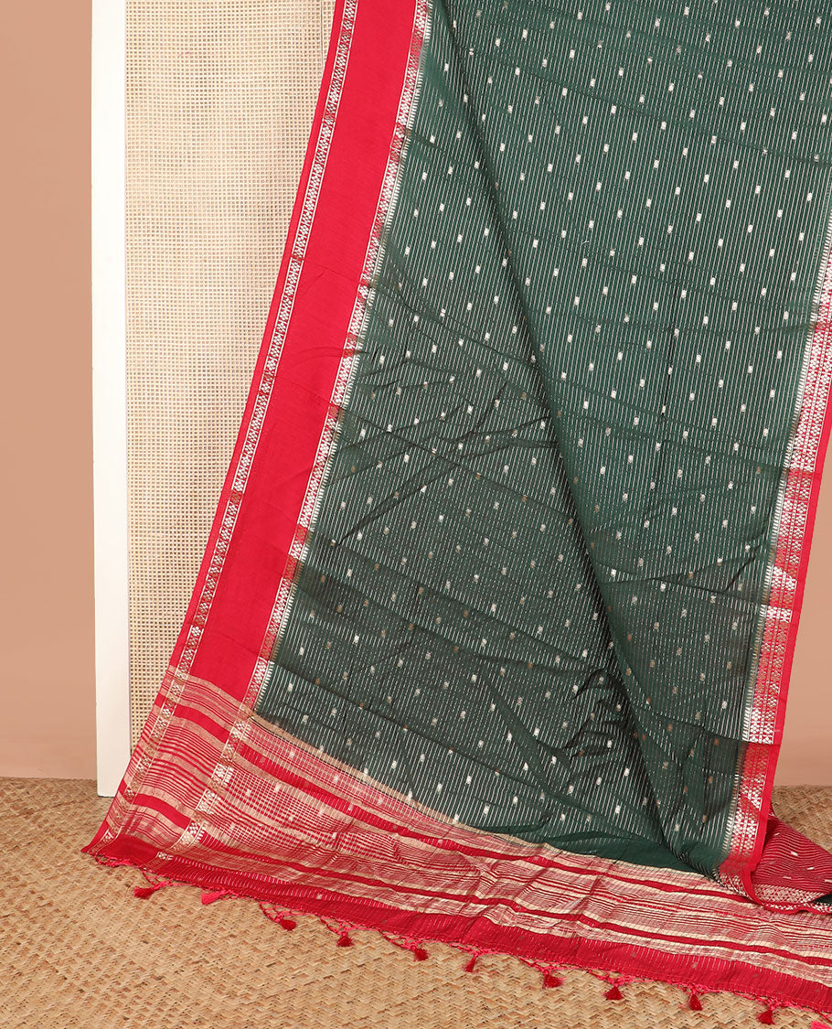 Green buttas and striped assam silk saree, contrast traditional zari border, and pallu of zari stripes