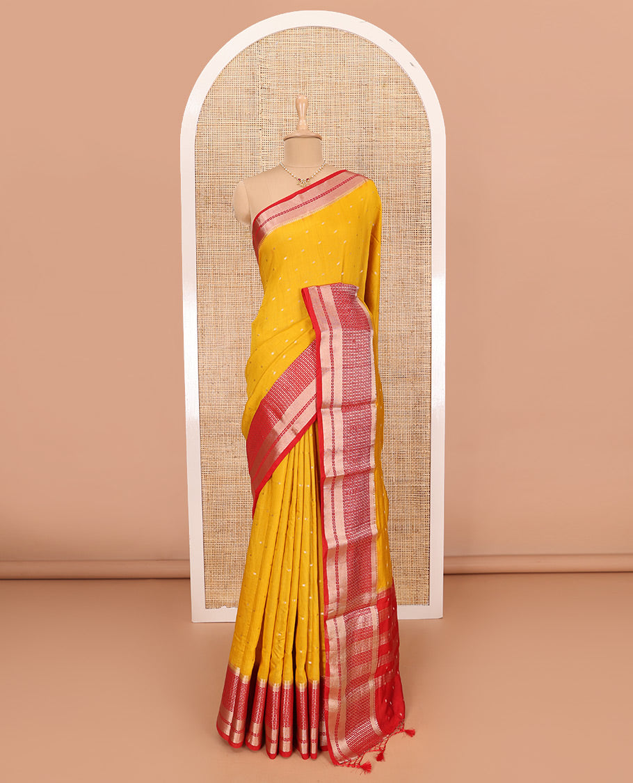 Yellow Assam Silk Saree Adorned with All-Over Buttas, Featuring a Contrast Temple Border of Butta Enclosed Checked Design, a Pallu Steeped with Zari Stripes, and Paired with a Contrast Zari Design Blouse