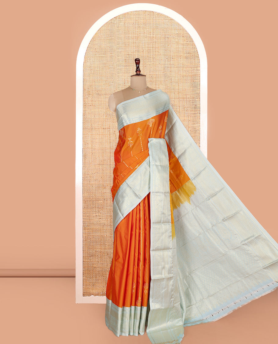 Orange Budget Silk Saree, Steeped in Richness of Zari Buttas on Its Body, Complemented by a Contrast Traditional Zari Design Border, Intricately Designed Pallu, and Paired with a Contrast Blouse
