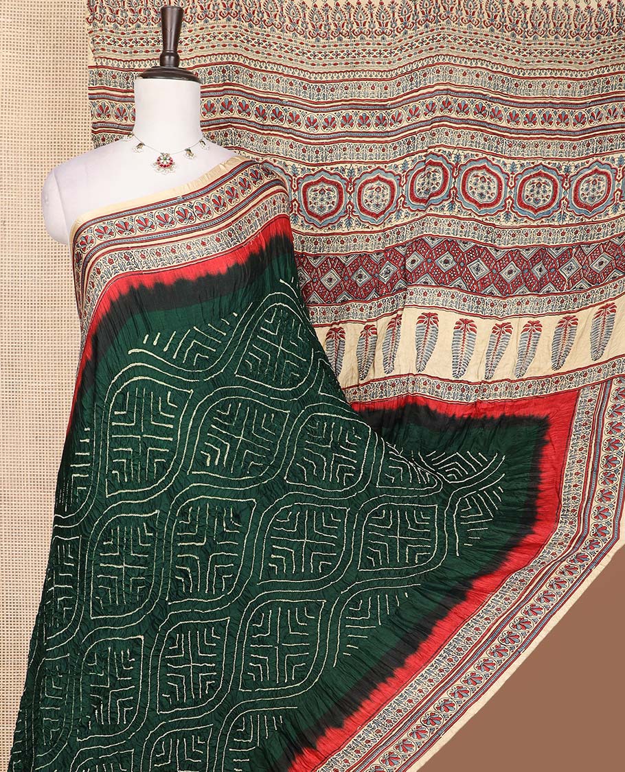 Green ogee theme bandhani dotted bandhani silk saree, contrast border, and pallu of intricate print