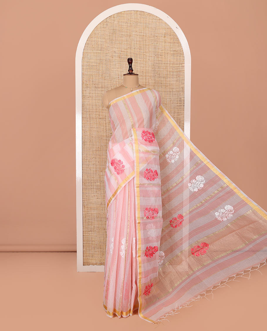 White and Pink Kota Cotton Saree, Mesmerized with Stripes and Floral Motifs Thread Embroidery on Its Body, Piping Border, Pallu Features Floral Embroidery, and Paired with a Matching Blouse