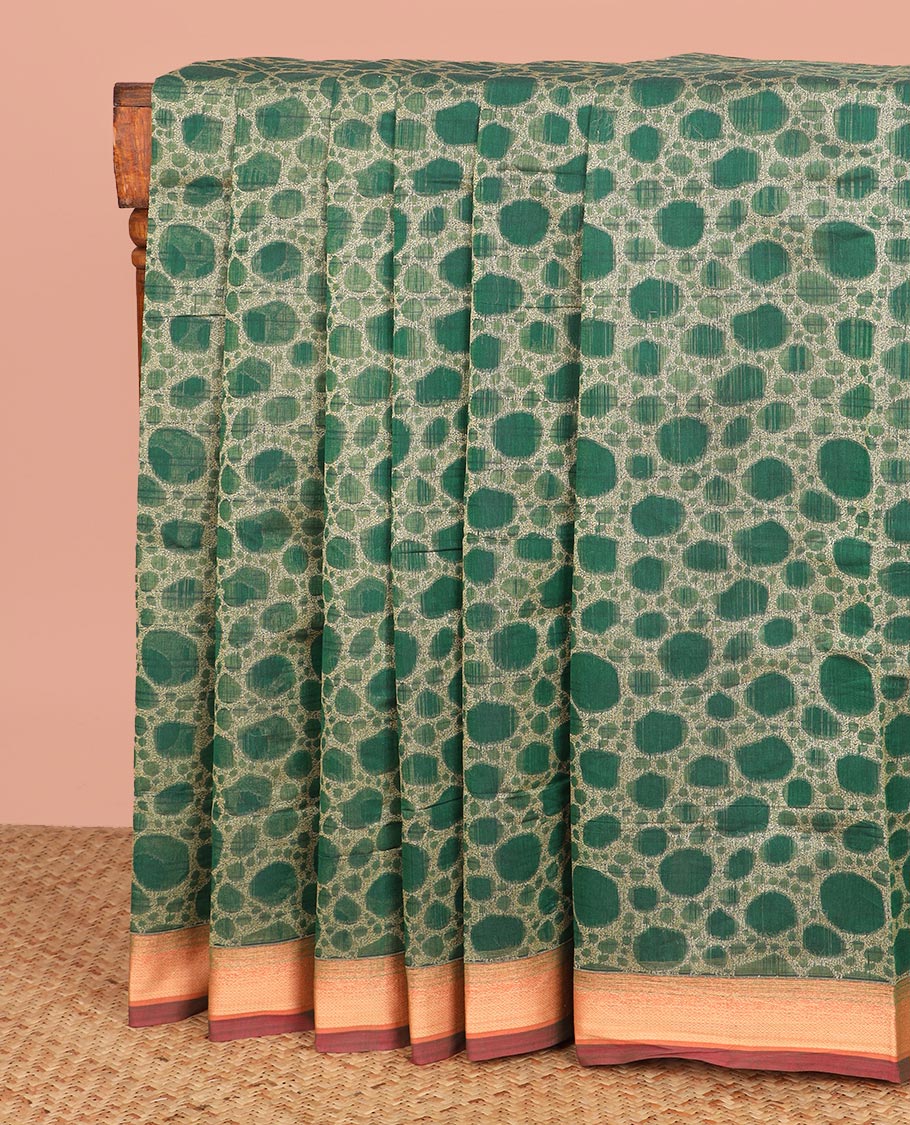 Green Coimbatore Cotton Saree Beautified with 3d Textures All Over Its Body, Complemented by Contrast Border, Pallu Depicts Intricate Designs, and Is Paired with a Matching Blouse