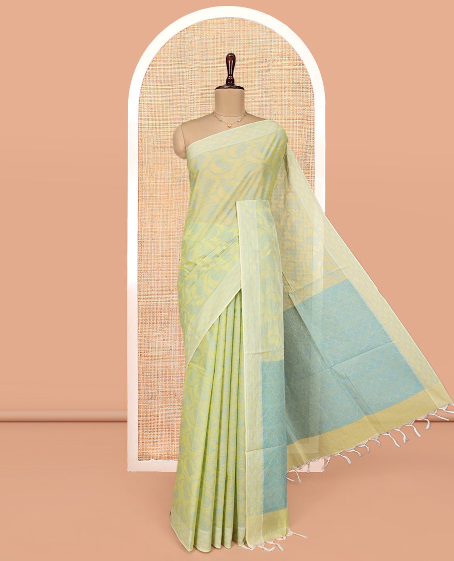 Pale Green Coimbatore Cotton Saree, Sparsely Woven with Floral Creeper Design on Its Body, a Subtle Diamond Border, Pallu of Ogee Patterns, and Paired with Matching Blouse