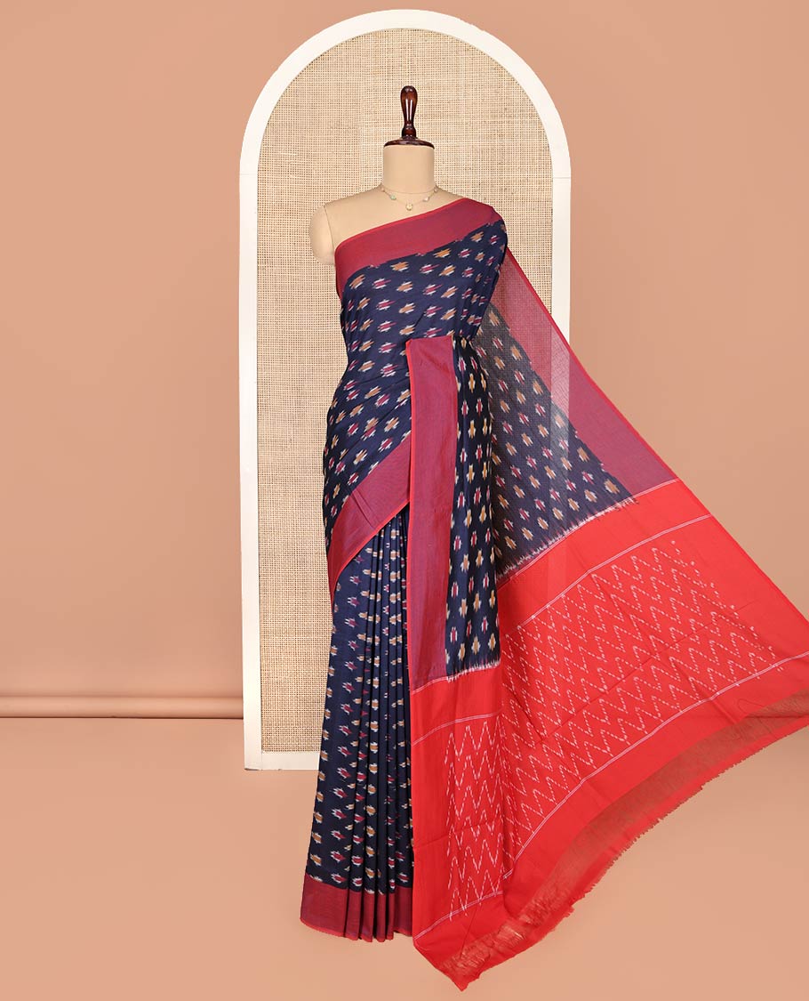 Blue Ikkat Cotton Saree, Embellished with Ikkat-Style Buttas on Its Body, Complemented by Contrast Plain Border, Pallu of Chevron Designs, and Has No Blouse
