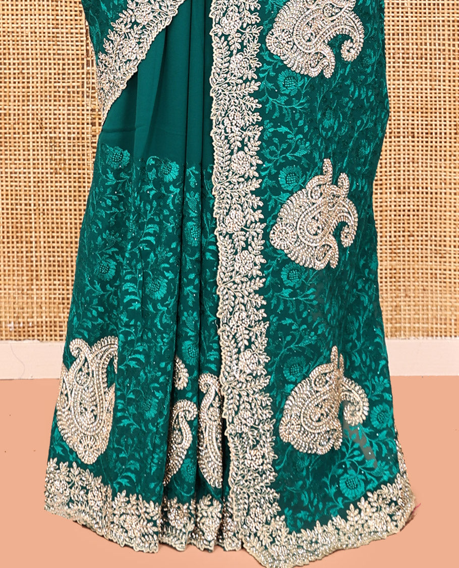 Green Designer Saree, Spotlighted with Floral Vine Embroidery, a Scallop Embroidered Border, and a Matching Blouse