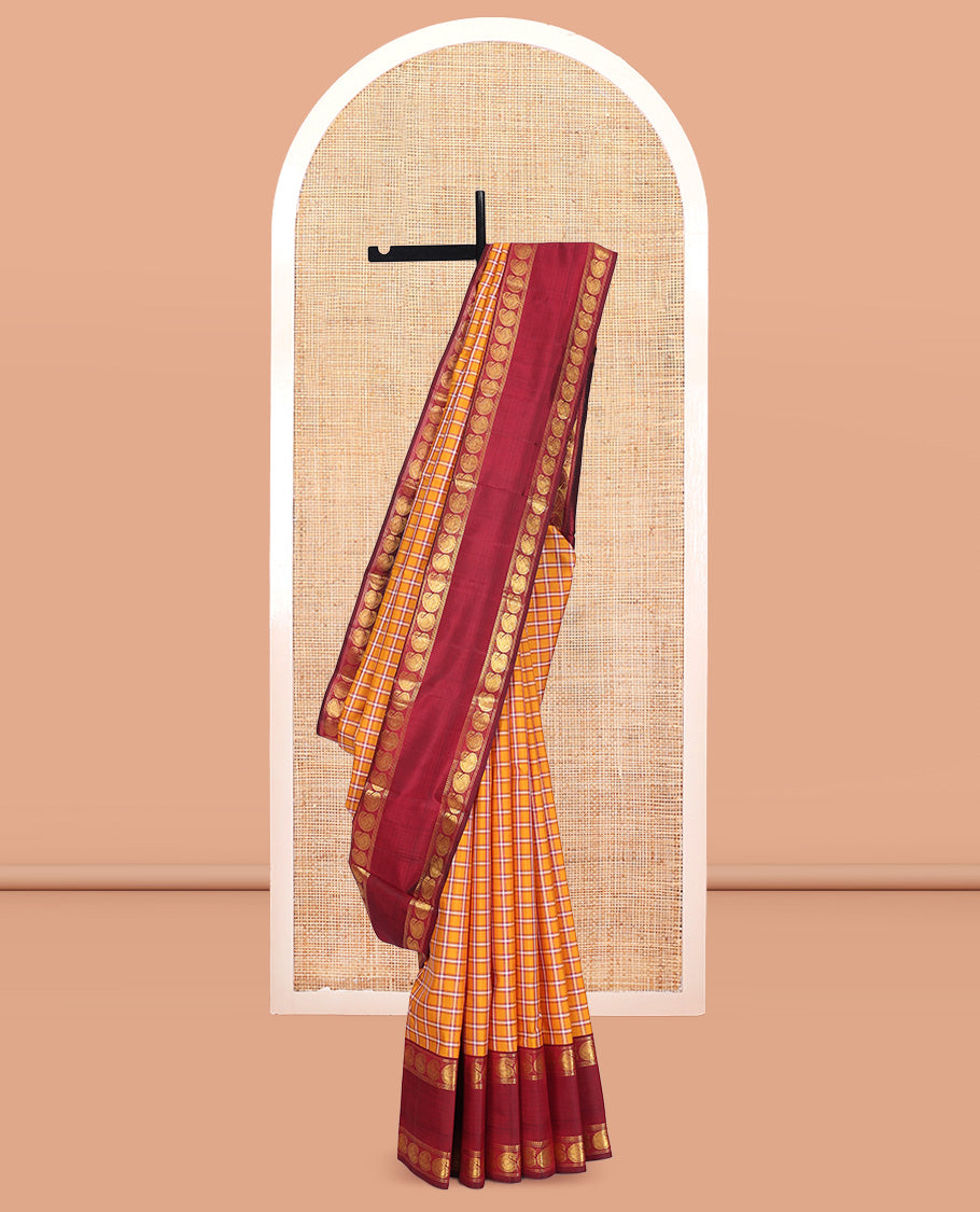 Orange Checked Kanchipuram Silk Saree, Complemented by a Contrast Rettai Pettu Manga Border, Zari Woven Pallu, and Contrast Blouse