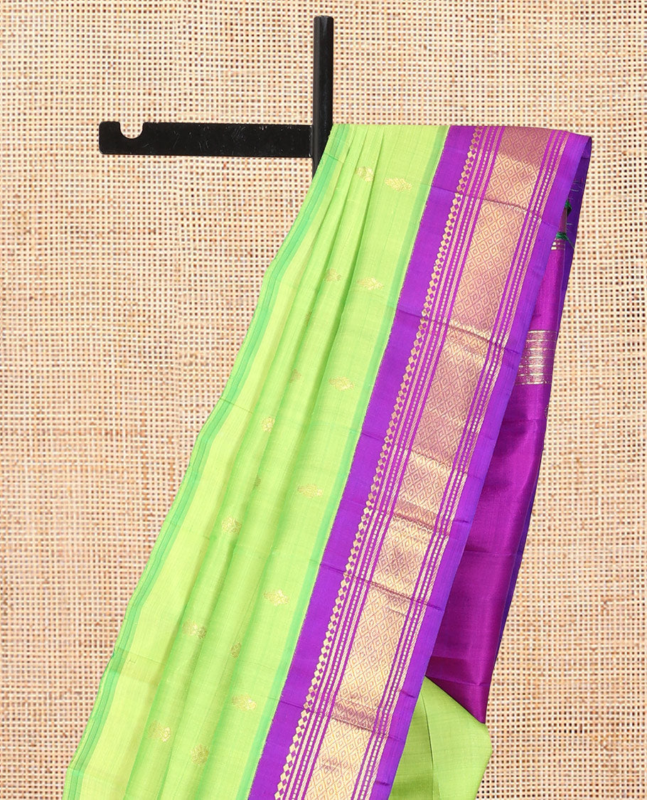 Green Kanchipuram Silk Saree, Delicately Woven with Zari Buttas, Complemented by a Contrast Korvai Border of Panner Sombu, Banaras, Muthu, and Mayil Kann Design, Pallu of Zari Design, and No Blouse
