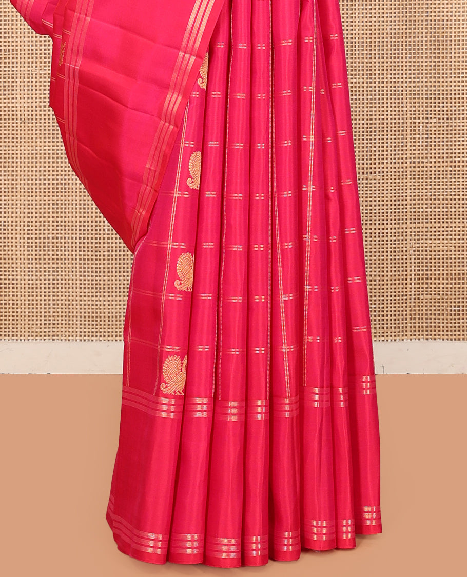 Pink Kanchipuram Silk Saree, Adorned with Mayil-Chakram Butta Enclosed Checks, a Zari Bodi Border, Zari Grand Pallu, and a Matching Blouse