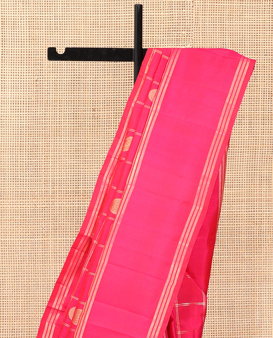 Pink Kanchipuram Silk Saree, Adorned with Mayil-Chakram Butta Enclosed Checks, a Zari Bodi Border, Zari Grand Pallu, and a Matching Blouse