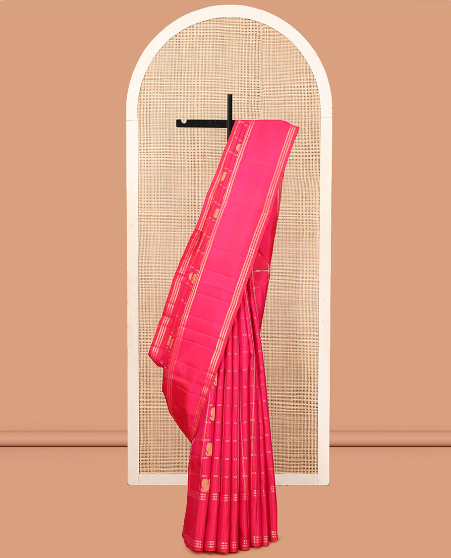 Pink Kanchipuram Silk Saree, Adorned with Mayil-Chakram Butta Enclosed Checks, a Zari Bodi Border, Zari Grand Pallu, and a Matching Blouse