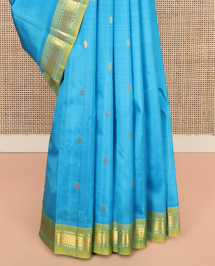 Blue Kanchipuram Silk Saree, Woven with Zari Buttas, Complemented by Contrast One-Sided Border of Rekku, and Mayil Kann Designs, Zari Design Pallu, and No Blouse