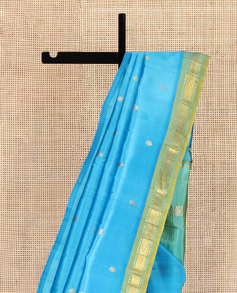 Blue Kanchipuram Silk Saree, Woven with Zari Buttas, Complemented by Contrast One-Sided Border of Rekku, and Mayil Kann Designs, Zari Design Pallu, and No Blouse