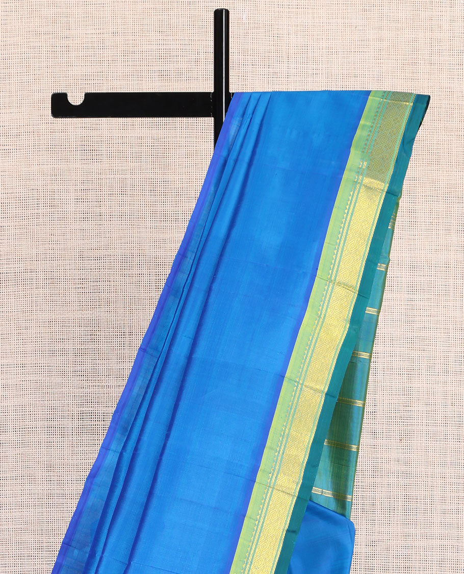 Blue Plain Kanchipuram Silk Saree, a Contrast One-Sided Border of Rekku, Banaras, and Jaal Designs, Zari Design Pallu, and No Blouse