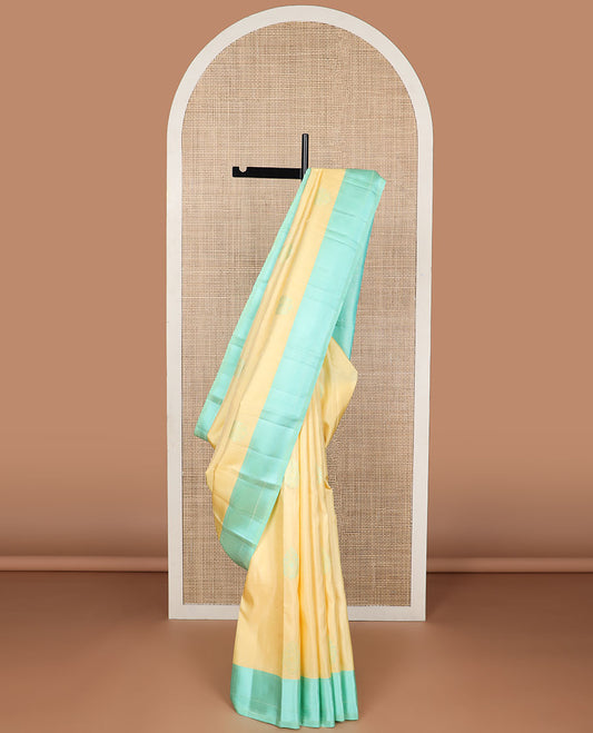 Yellow buttas kancheepuram silk saree with contrast zari design border & argyle design pallu