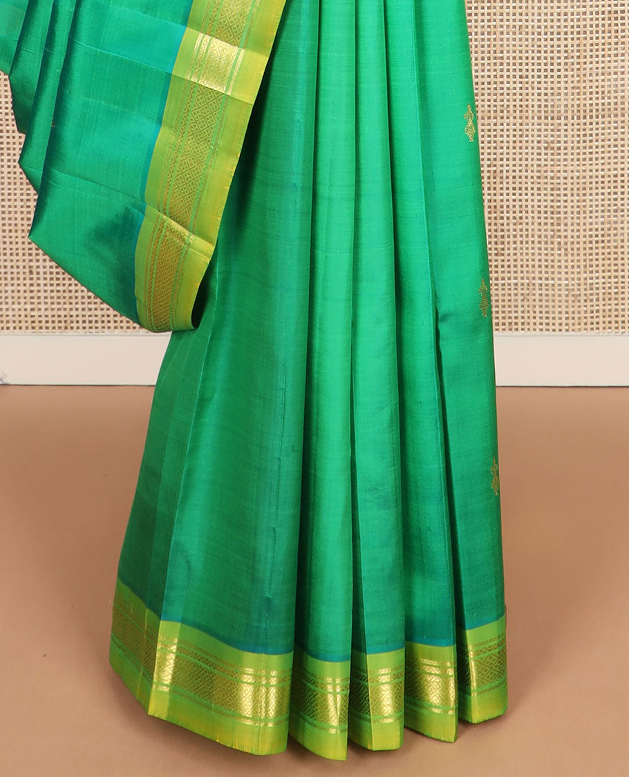 Green zari buttas Kanchipuram silk saree, contrast one-sided border of banaras, neli & jaal & zari design pallu