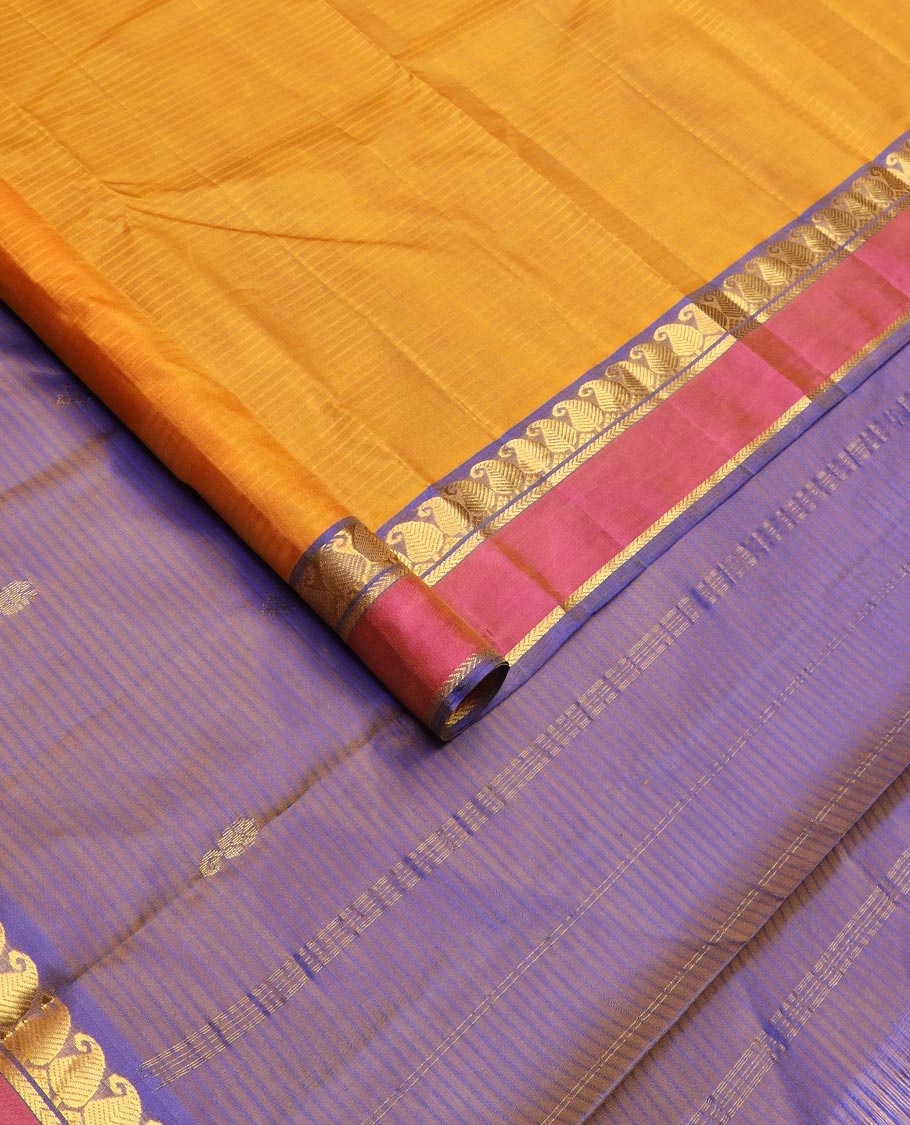 Yellow striped and buttas Kanchipuram silk saree, contrast rettai pettu border of vanki manga, and kathir designs, and zari design pallu
