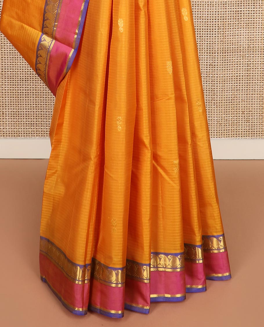 Yellow striped and buttas Kanchipuram silk saree, contrast rettai pettu border of vanki manga, and kathir designs, and zari design pallu
