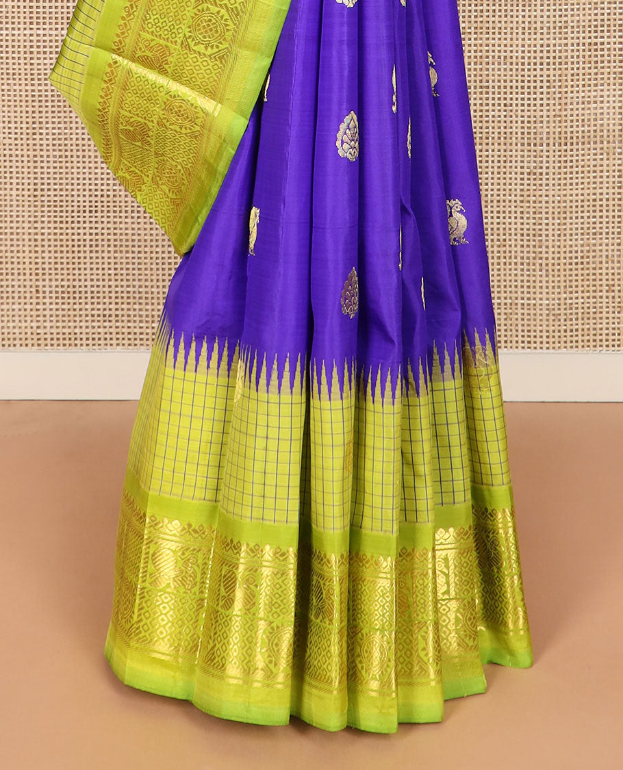 Blue zari buttas Kanchipuram silk saree, contrast thazampoo rekku checked border of mayil chakram designs, and floral design pallu