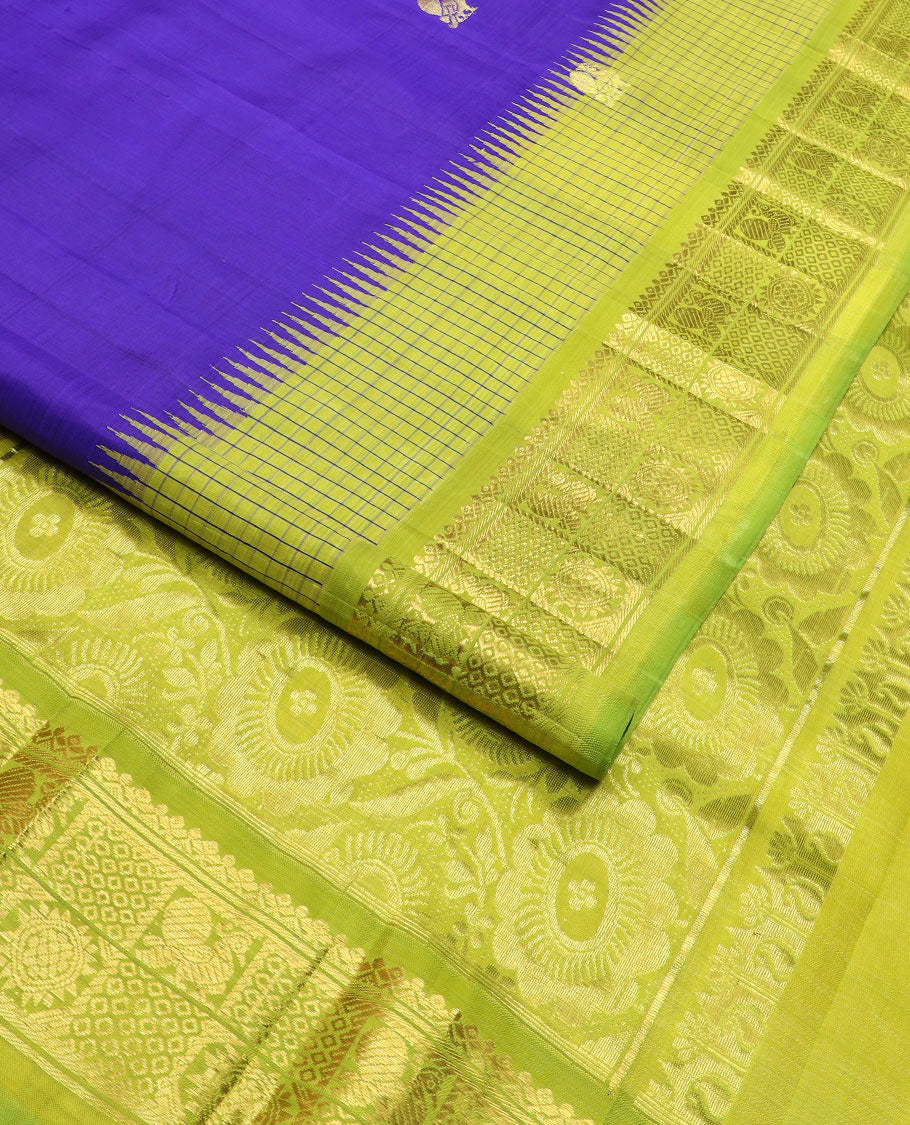 Blue zari buttas Kanchipuram silk saree, contrast thazampoo rekku checked border of mayil chakram designs, and floral design pallu