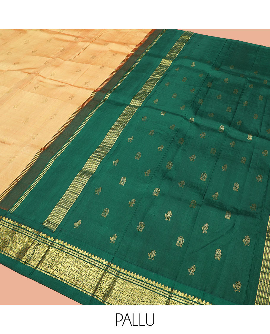 Orange Kanchipuram Silk Saree Sparsely Sparkled with Zari Buttas, Highlighted by Contrast One-Sided Korvai Border of Thilakam Mokku, Banaras, and Jaal Designs, Pallu Spotlighted with Zari Designs, and Comes Without a Blouse
