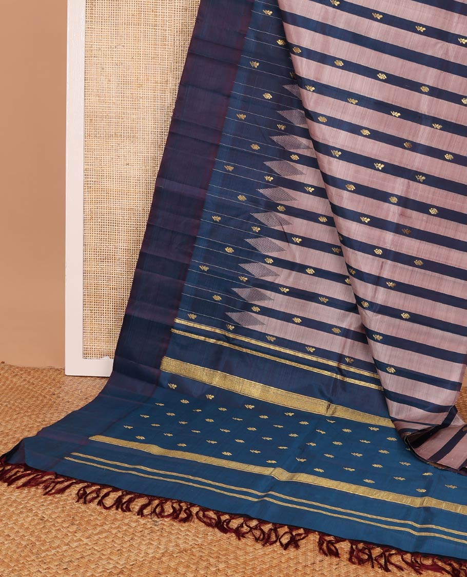 Blue & pink striped kancheepuram silk saree with floral zari buttas, one-sided plain border & zari design pallu