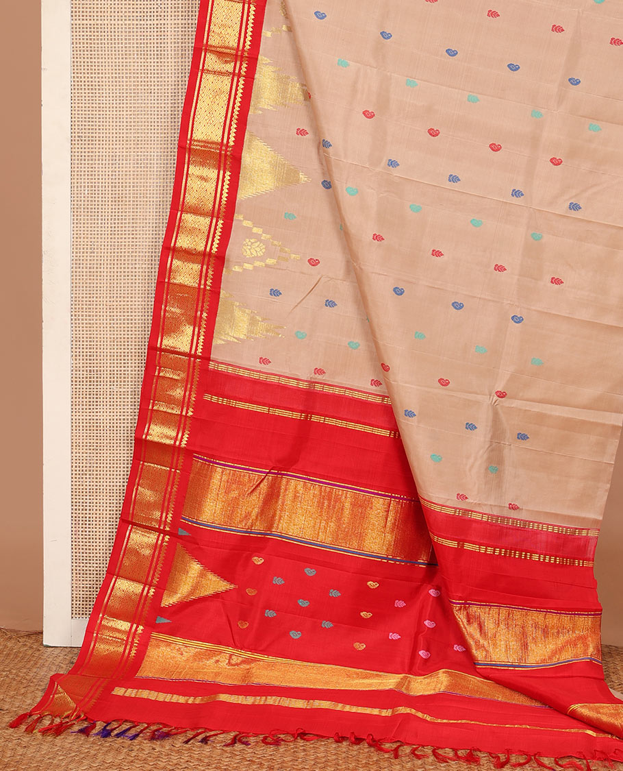Sandal zari and thread buttas Kanchipuram silk saree, contrast one-sided korvai border of thikalam mokku, and jaal, and thazampoo rekku pallu