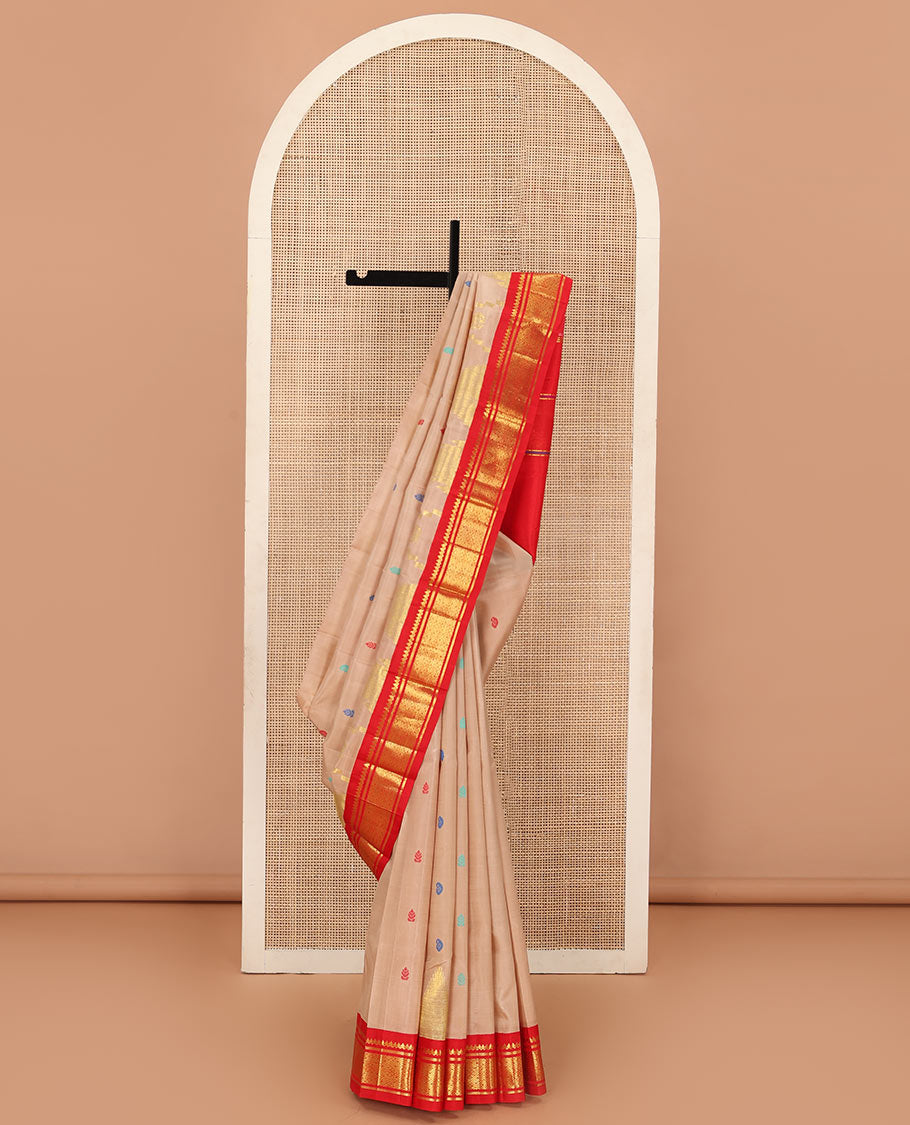 Sandal zari and thread buttas Kanchipuram silk saree, contrast one-sided korvai border of thikalam mokku, and jaal, and thazampoo rekku pallu