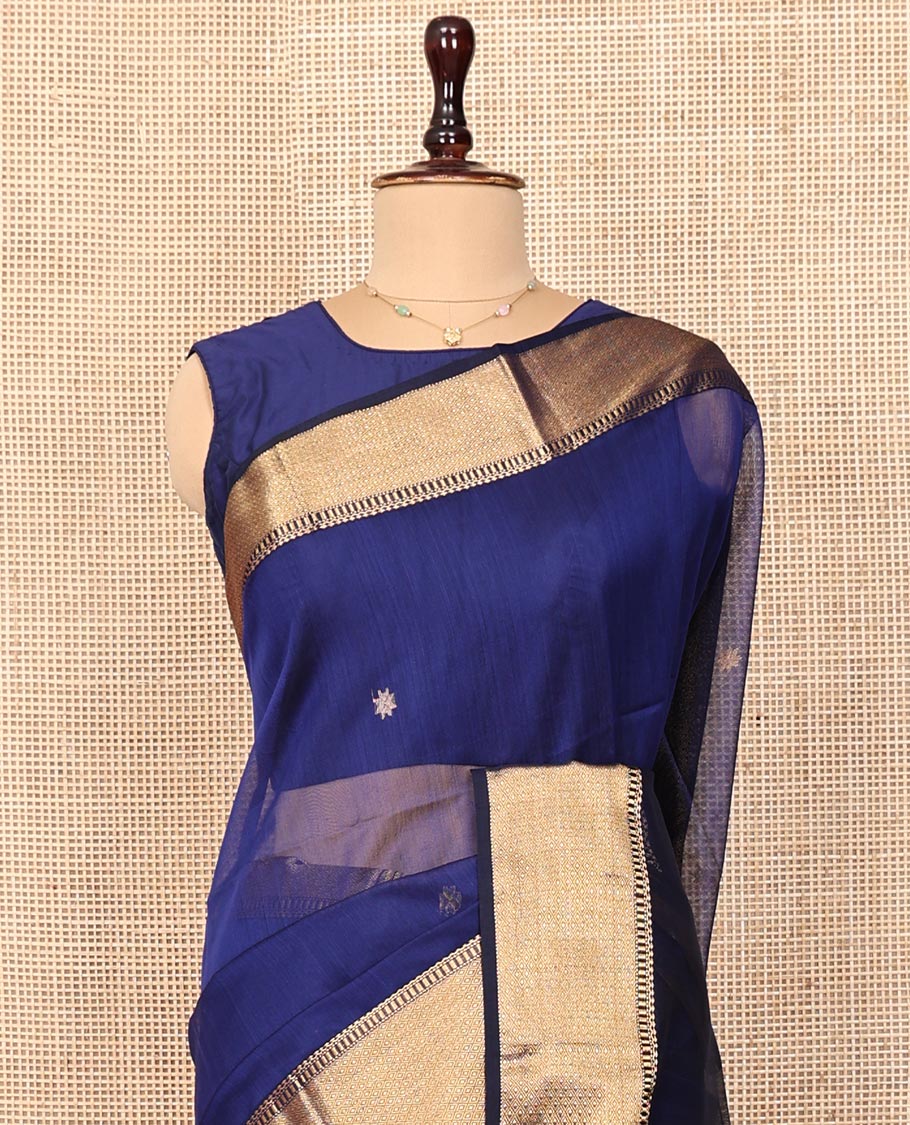Blue Maheshwari Cotton Saree, Gleamed Up with Zari Buttas on Its Body, Highlighted by a Traditional Zari Design Border, Complemented by a Contrast Pallu of Chevron Designs, and Paired with a Contrast Blouse