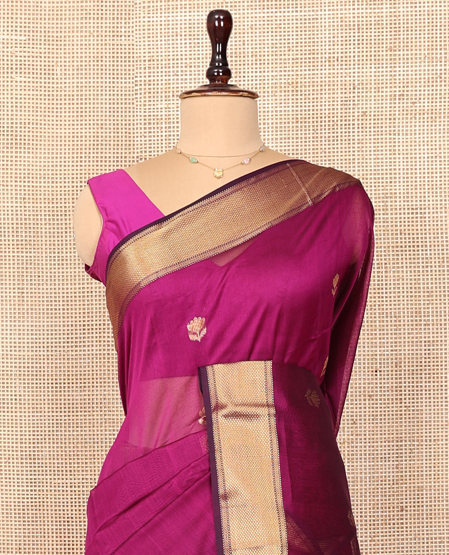 Purple Maheshwari Cotton Saree, Charmingly Accented with Floral Buttas All Over Its Body, Highlighted by Traditional Zari Border, Pallu Steeped with Gleaming Zari Stripes, and Paired with a Matching Blouse