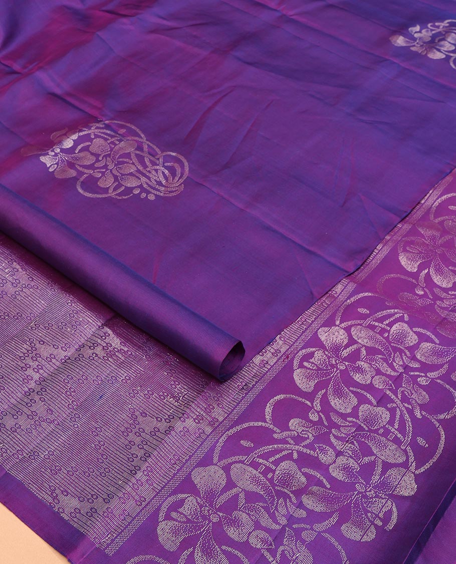 Borderless Violet Mayuri Soft Silk Saree Prettified with Zari Buttas All Over Its Body, Highlighted by Pallu of Geometric Designs, and Paired with a Matching Blouse